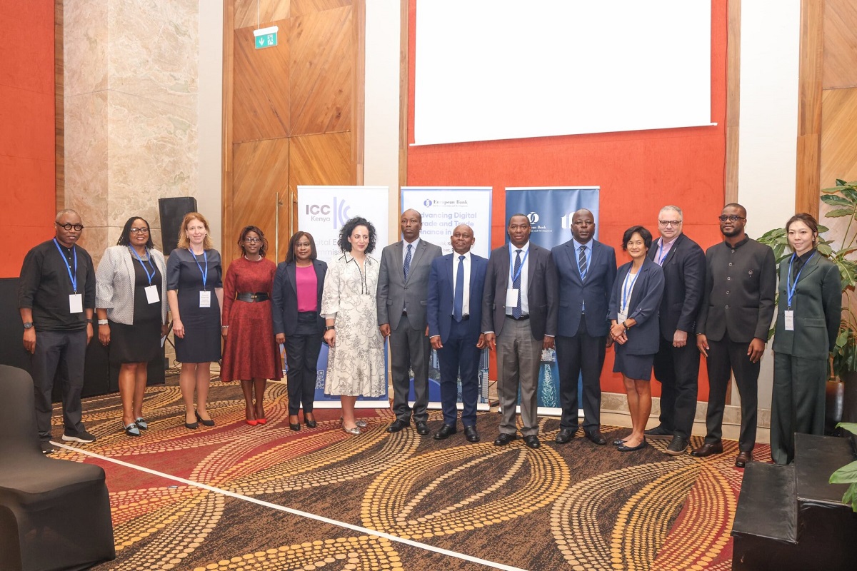 Kenyan digital-trade workshop showing government, finance and technology stakeholders, or an editorial image combining Nairobi, mobile payments and cargo logistics.